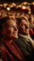 Smiling couple enjoying a festive event in a cozy venue during winter season photo