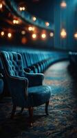 Elegant blue armchair in an opulent theater during a quiet evening performance photo