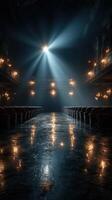 Elegant theater illuminated by spotlight at night, showcasing rows of empty seats and a reflective floor photo