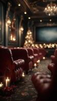 Cozy red leather chairs line a charming room adorned with Christmas decorations and soft candlelight in the evening photo