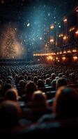 Audience captivated by a festive performance in a grand theater during the holiday season photo