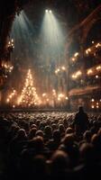 Christmas celebration in a grand theater filled with audience watching a performance during the festive season photo