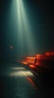 Mysterious theater seats illuminated by a beam of light in a dimly lit performing arts venue photo