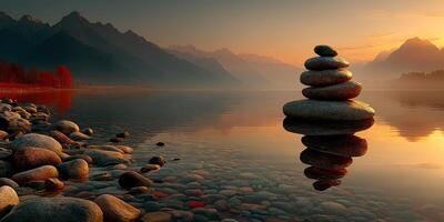 Sunset reflection over calm lake with stacked stones near mountains in peaceful setting photo
