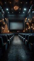 Elegant vintage theater decorated for the holiday season with a Christmas tree and empty seats ready for moviegoers photo