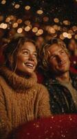 Couple enjoying a cozy movie night in a theater filled with soft lights and a warm atmosphere photo