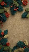 Beautiful arrangement of decorative evergreen branches and flowers on textured background during festive season photo
