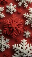 Snowflakes on a vibrant red background create a festive holiday atmosphere suitable for winter celebrations and decorations photo