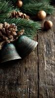 Decorative bells with pine branches and pine cones for holiday ambiance during winter season photo