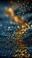 Golden particles shimmer above a deep blue surface during a dynamic display of light and texture photo