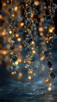 Decorative string lights illuminate a serene setting with blue beads during twilight photo