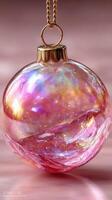 Stunning glass ornament reflecting vibrant colors against a soft gradient background during a festive celebration photo