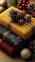 Colorful wrapped gifts adorned with pine cones and berries on a festive table during the holiday season photo