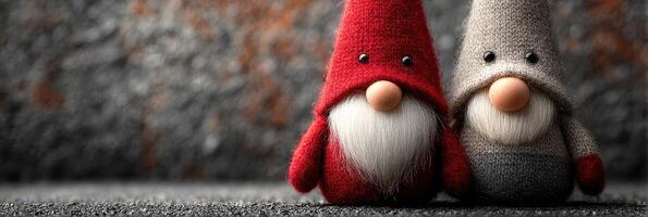 Decorative gnomes in felt hats display charming friendship on a textured background during a cozy indoor setting photo