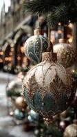 Decorative ornaments hang on a beautifully adorned tree in a festive holiday setting photo