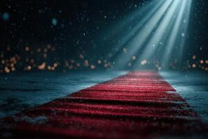 Red carpet leading into the spotlight during a snowy night gala event with blurred lights in the background photo