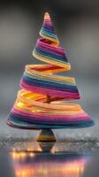 Colorful twisted tree with glowing lights enhances festive mood during winter season photo