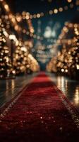 Elegant red carpet lined with sparkling lights and Christmas trees creates a festive atmosphere for a special winter event photo