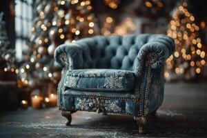 Cozy blue tufted armchair surrounded by festive Christmas decorations in a warm, inviting setting photo