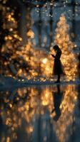 Child standing in winter landscape, illuminated by glowing lights and reflections during twilight hours photo