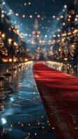 Elegant red carpet leading through a sparkling street filled with lights on a rainy evening photo