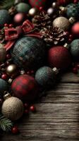 Colorful Christmas ornaments and natural elements create a festive arrangement on a wooden background photo