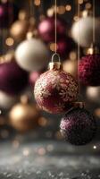 Festive holiday ornaments in red, gold, and black with shimmering background lights creating a warm atmosphere photo