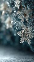 Beautiful golden snowflakes hang delicately from a decorated tree in a winter wonderland setting with soft bokeh lights photo