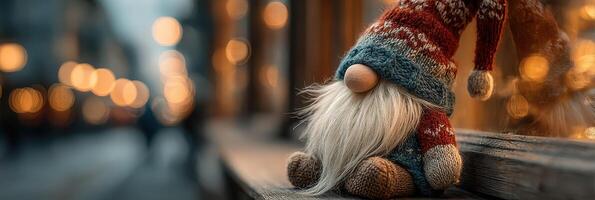Gnome decoration sits on wooden bench during cozy evening in festive street lights photo