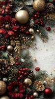 Beautiful holiday decorations featuring red flowers, golden ornaments, and pine branches arranged on a white background photo