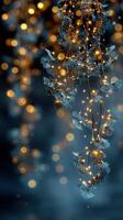 Delicate silver leaves adorned with glowing lights create a magical ambiance in a dimly lit space photo