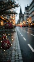 Holiday decorations illuminate a festive street with Christmas lights and ornaments at dusk in a historic town photo