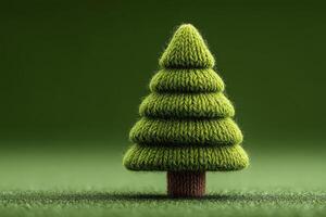 Decorative green knitted tree stands prominently against a solid green background showcasing craftsmanship and seasonal charm photo