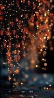 Elegant floral decorations with shimmering lights create a magical ambiance during an evening celebration photo