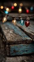 Charming string of colorful lights draped over rustic wooden planks in a cozy setting photo