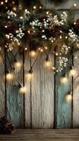Cozy winter decorations featuring string lights, pinecones, and white flowers arranged on a rustic wooden backdrop photo