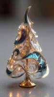 Elegant decorative tree showcasing intricate silver and blue swirls, illuminated with soft lights for festive ambiance photo