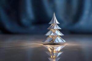 Decorative glass Christmas tree with lights reflecting softly on the surface photo