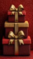Colorful stacked gifts with golden bows on a textured red background for festive celebrations and special occasions photo
