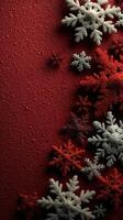 Decorative snowflakes in red and silver arranged on a festive red background for holiday celebrations photo