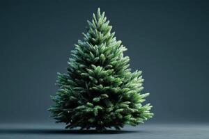 Artificial evergreen tree with lush branches set against a dark backdrop suitable for festive decorations during winter holidays photo