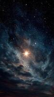 Starlit night sky with bright celestial body shining above swirling clouds in a vast expanse of the universe photo