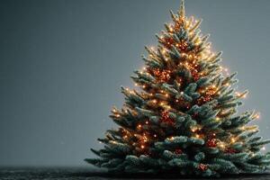 Beautifully decorated Christmas tree shining in festive lights during the holiday season at home photo