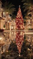 Festive holiday lights illuminate a vibrant Christmas tree in a luxurious shopping district at night photo