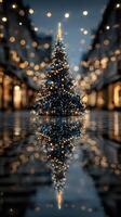 Decorative Christmas tree adorned with lights reflects on a rainy street during the holiday season in a bustling city photo