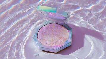 Holographic compact highlighter with shimmering texture on an iridescent water background. Trendy pastel makeup product with luxurious glow and dreamy visual aesthetic. photo