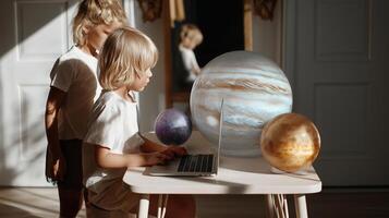 Children learning about planets and space at home using a laptop, exploring the solar system through interactive online education in a bright, modern room. photo