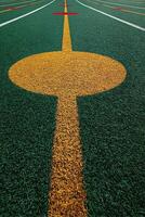 A tennis court with a red line on it photo
