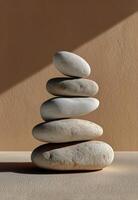 A stack of stones on a table photo