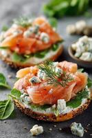 Smoked salmon bagels with cream cheese and spinach photo